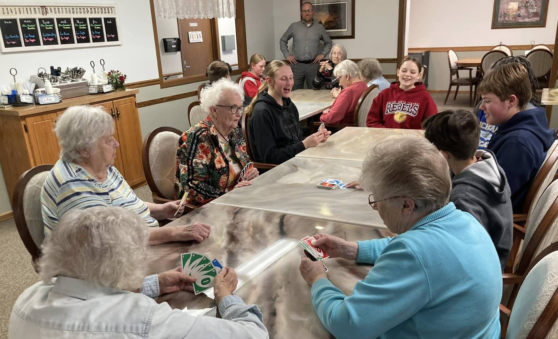 Shepherds Inn residents and local young people playing cards together